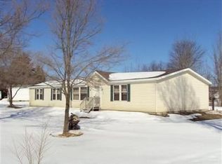 7158 S Apple Hill Rd, Rothbury, MI 49452