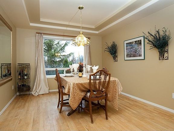 Gorgeous dining area with coffered ceiling