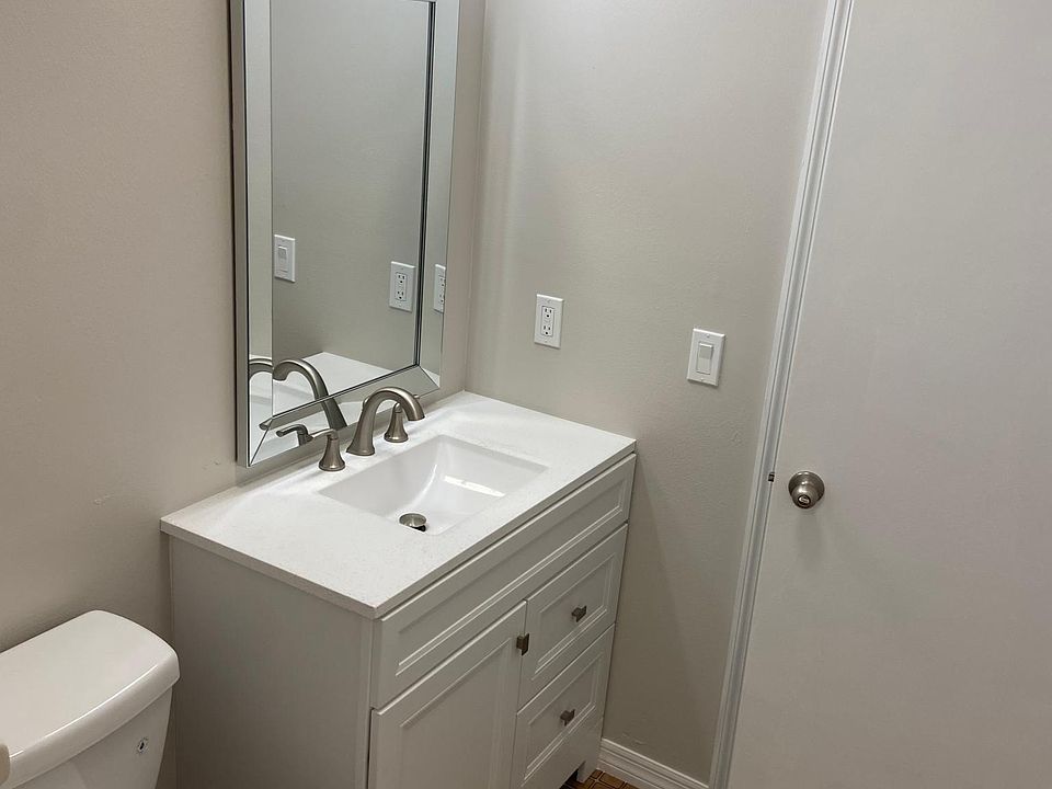 master bathroom with tub/shower, has exterior enterance
