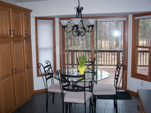 Gorgeous eating area with a slider door to the back deck.