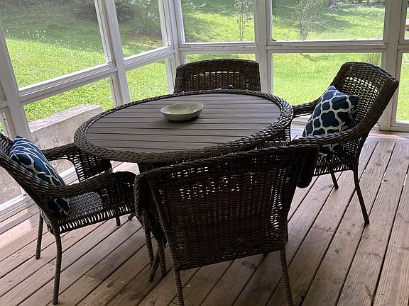 Enjoy coffee or lunch on screened porch