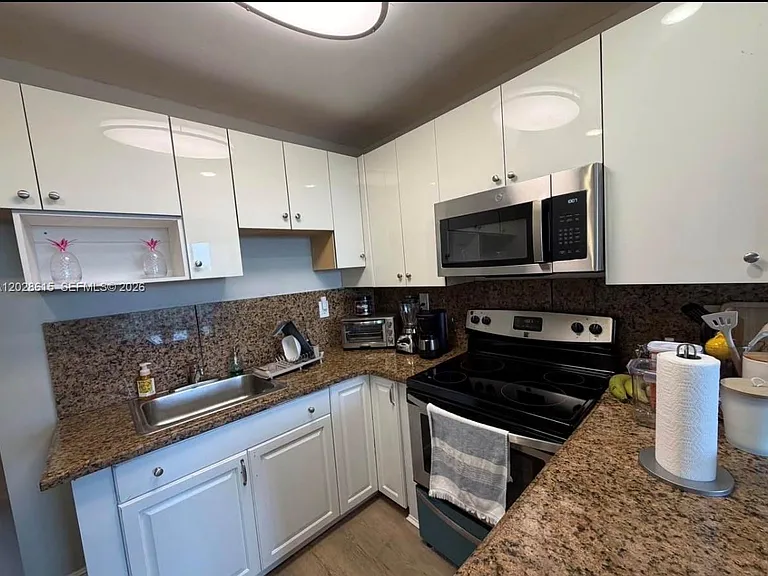 3551 SW 9th Ter #409 — Photo 6