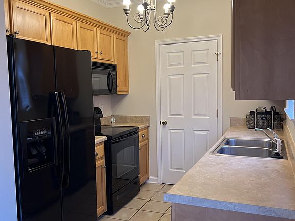 Kitchen With Stove, Fridge, Microwave And Dishwasher Included
