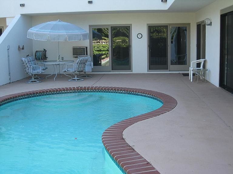 pool, main entrance to unit
