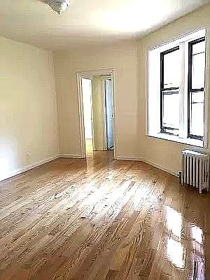5th image of 99 E 4th St APT 1