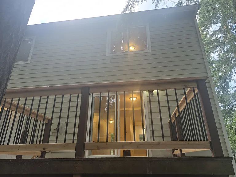 Patio that has few steps to ground level back area