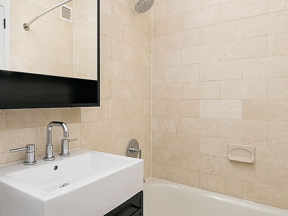 5th image of 63 Wall St APT 3205