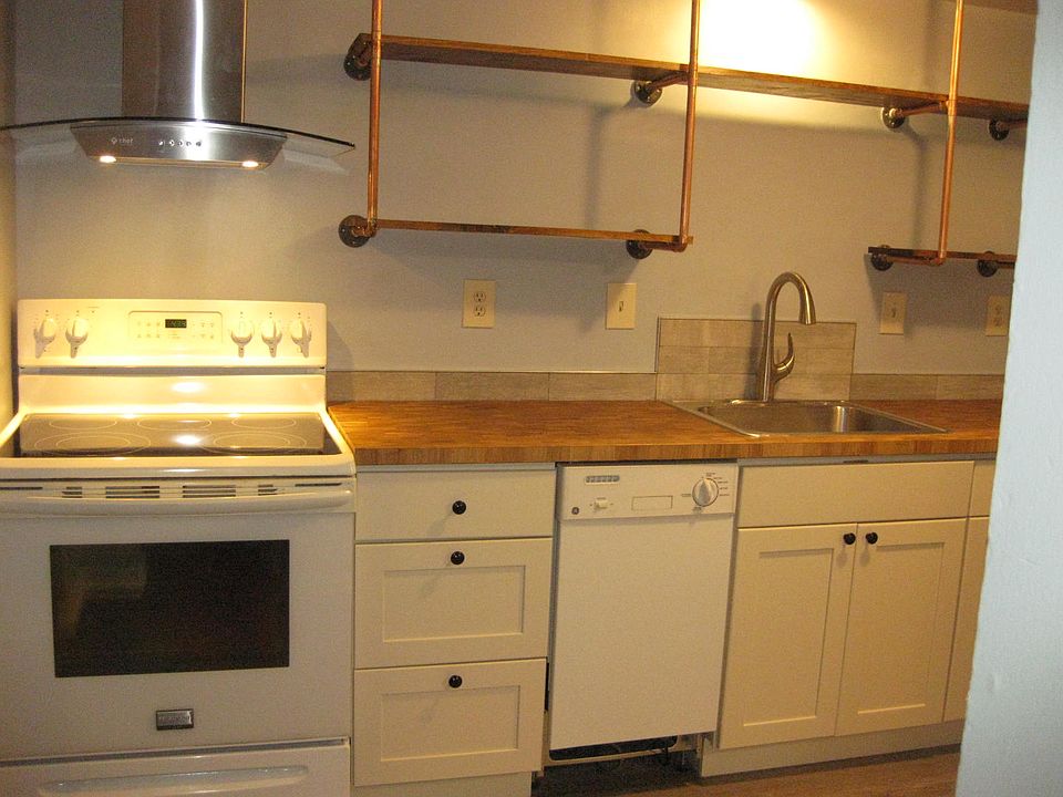 Updated kitchen with exposed shelves. Dishwasher too!1