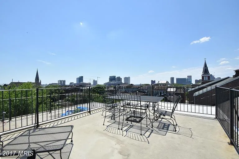 Huge rooftop deck with sweeping city view comes furnished - all you have to do is enjoy!