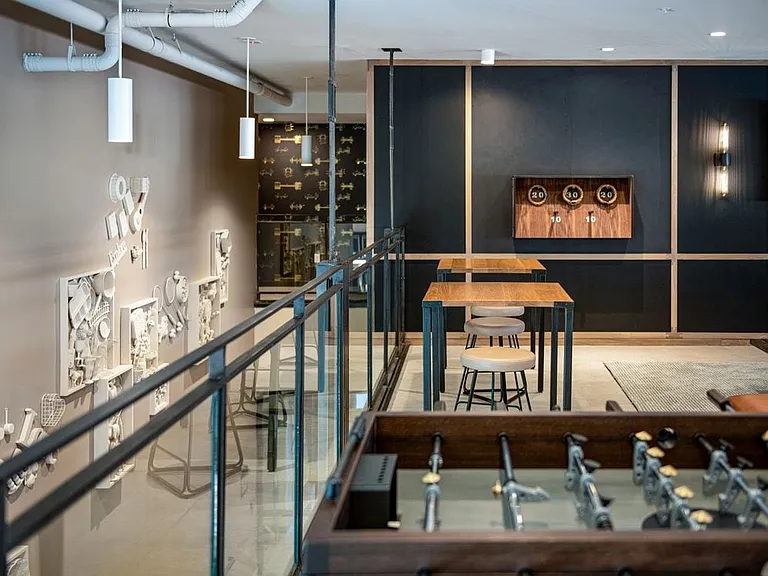 Mezzanine lounge area with gaming and seating
