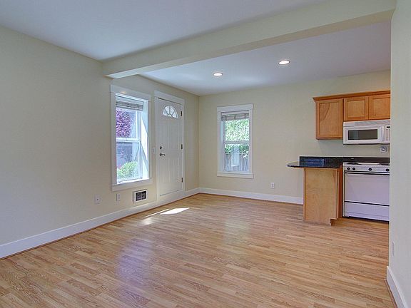 Living room looking towards the kitchen and entry