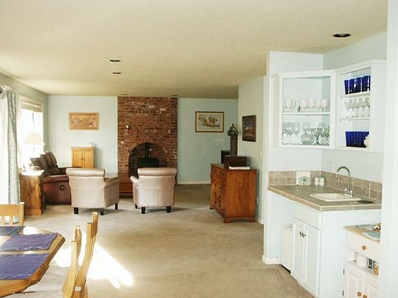 Open floor plan; wet bar.