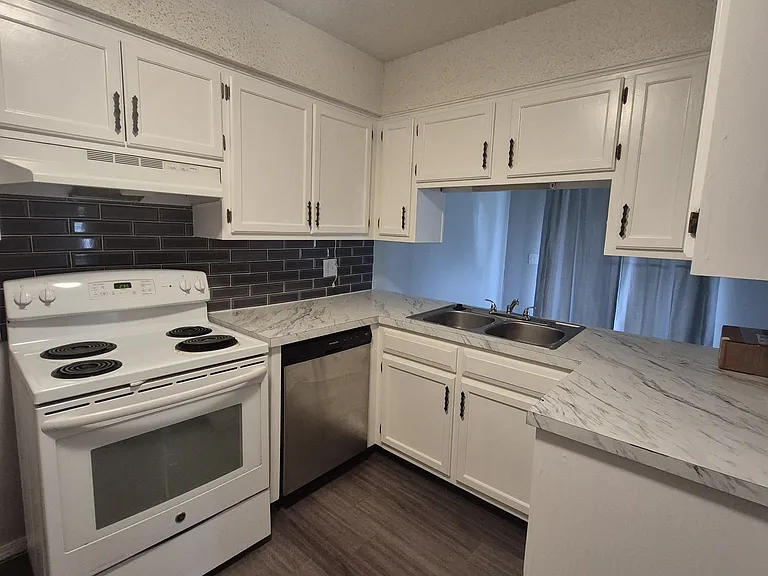 8247 N 117th East Ave — Photo 10