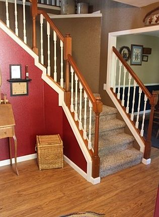Newer laminate floors, painted trim and stair case with display niche offers an inviting feel when guests come through the front door.