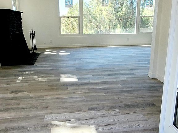 View from French doors to dining room out to the spacious living