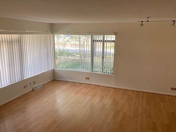 Living Room (plenty of natural light, large windows)