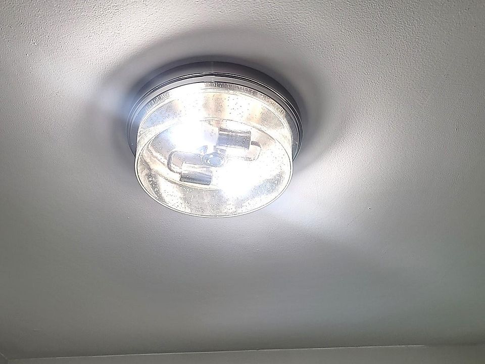 New, seeded glass lighting in the kitchen.