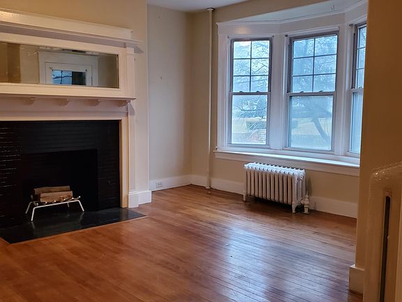 Living room with decorative fireplace