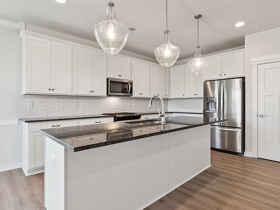 The kitchen of the Monet on homesite 1010 by Brookfield Residential