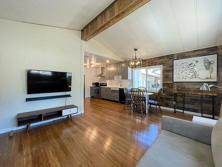Open floor plan with enormous beautiful windows and bountiful natural light.