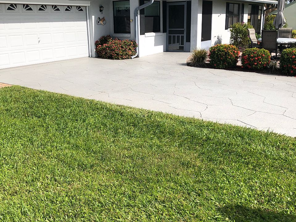 Lawn maintenance included. Two car garage with motorized screen. Front brick paver patio. Large glass and screened sun room. Fully furnished.