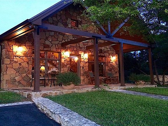 Cottage Exterior and Patio at dusk. perfect for that evening