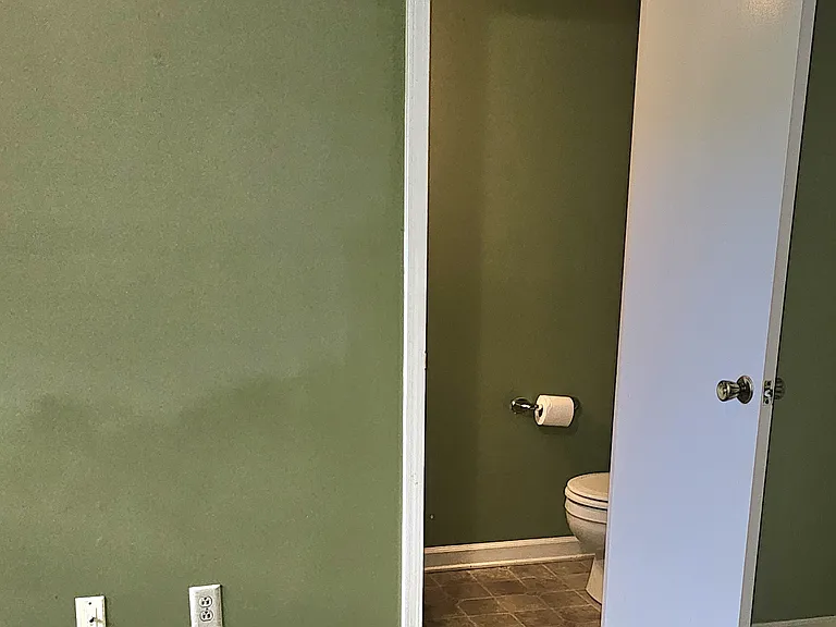 Attached half bathroom to the second bedroom