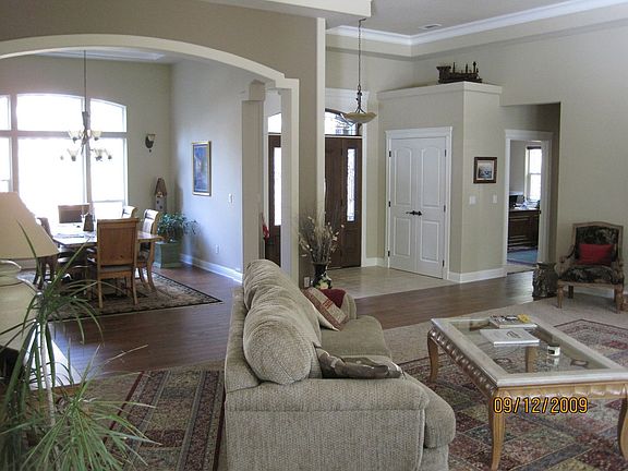 formal dining room and entry, nice arches, travertine, large crown molding