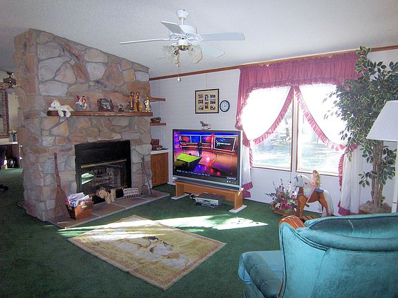 great room with wood burning fireplace