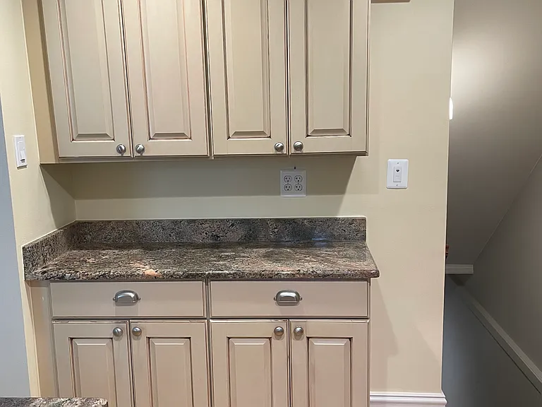Kitchen, stairs to basement