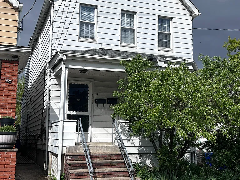 Two family house in a quiet residential area.