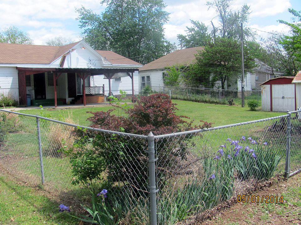 Landscaped fenced backyard