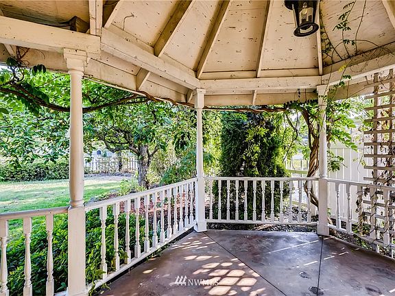 Covered seating area on the front porch. 