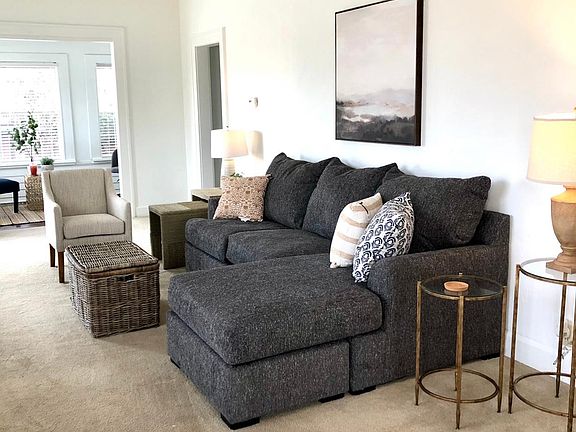 Oversized living room with luxurious new furnishings.