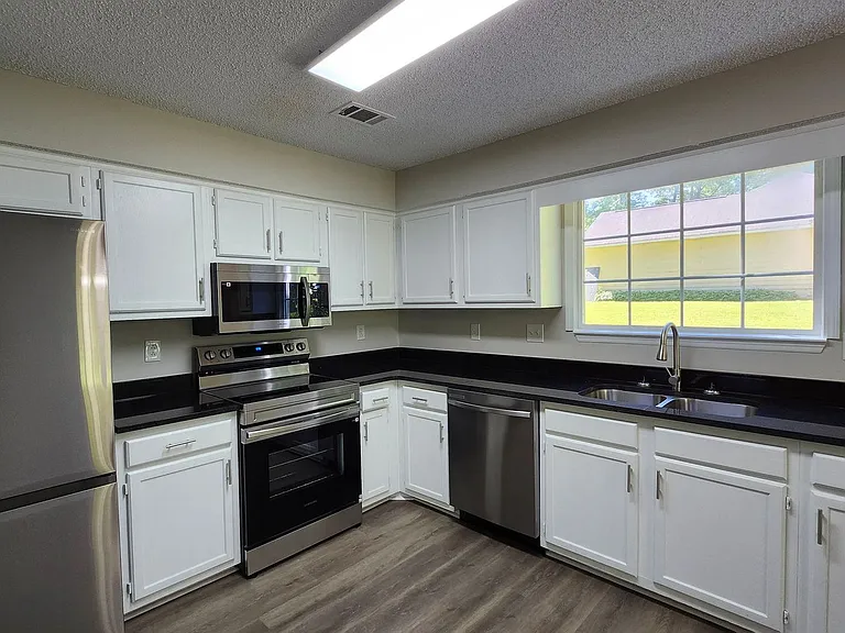 7847 Sugarland Dr — Photo 3