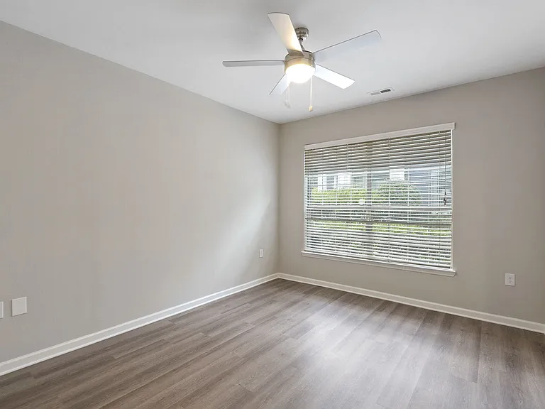 Spacious bedrooms can accommodate any bed size.