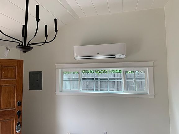 Welcoming entry. Double pane windows throughout are noise and temperature-controlled.