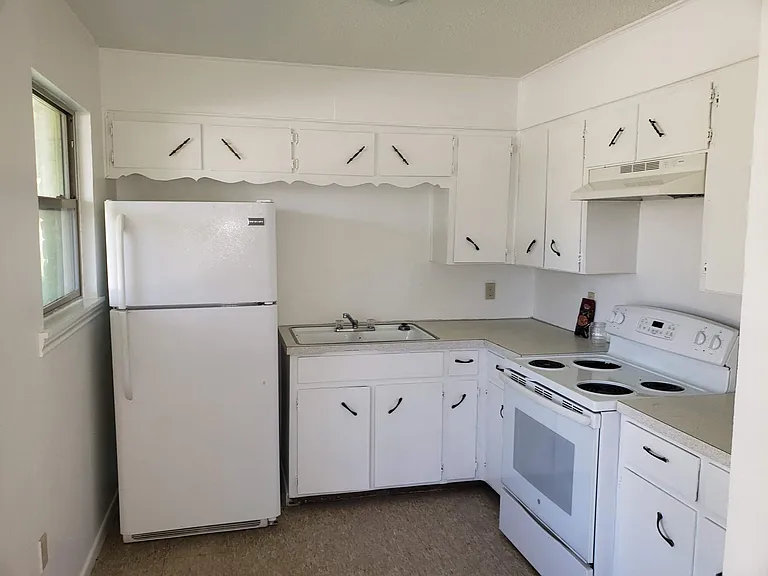 Kitchen New Refrigerator, stove & Mircowave.