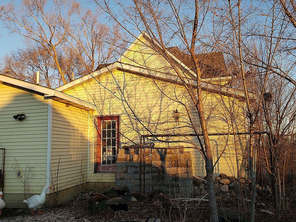 W side, kitchen and mud room