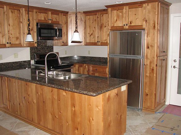 Updated Kitchen with granite countertops and stainless appliances.