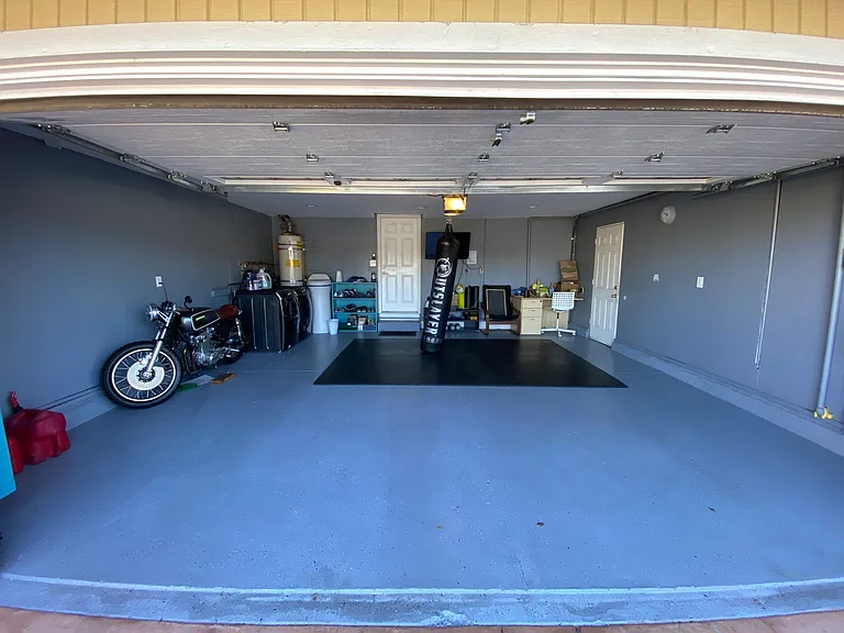 Finished 2 car garage with recessed lights, washer & dryer, water softener