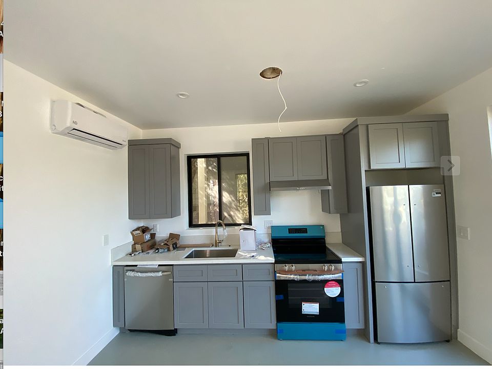 Brand new kitchen! New HVAC A/C and heating in living area and bedroom!