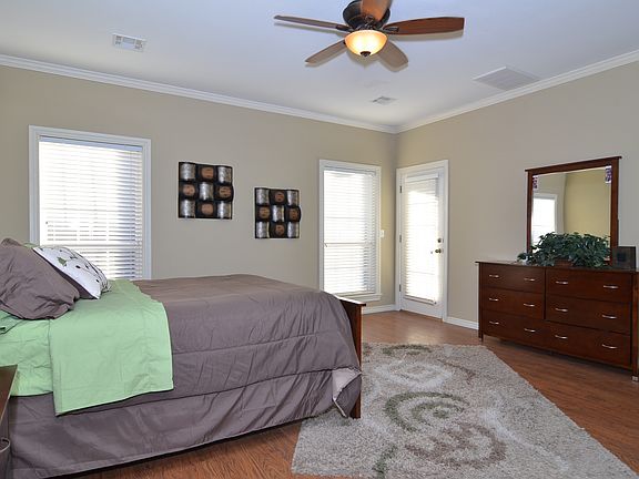 Master with Private access to covered back patio