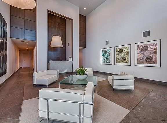 Another view of the lobby showing the doorman desk - fabulous art work adorns the walls of the common spaces