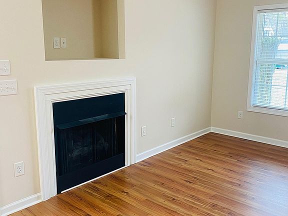 Spacious living room with gas logs
