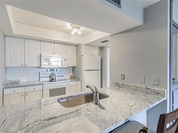 4th image of 2616 Cove Cay Dr Unit 404
