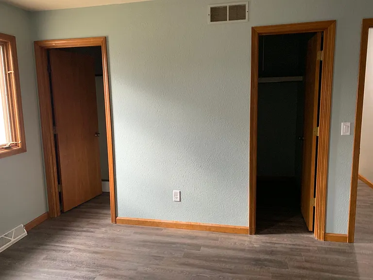 Master bedroom suite features walk-in closet and private bathroom