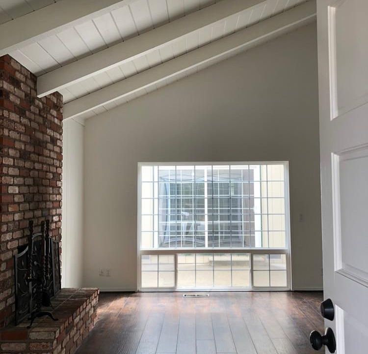 Entrance, one step down into living room