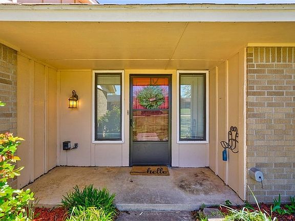 Having an ample, covered front porch is so welcoming when it's raining or the wind is blowing. There's even room for seating and a trickling water feature!