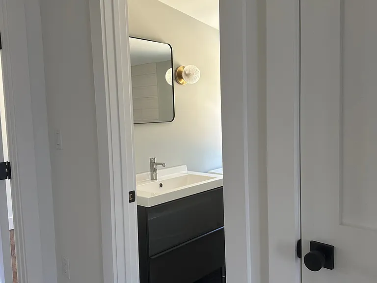 Second floor, full bathroom with tub.